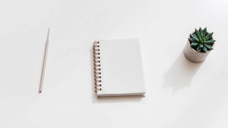 Selection of elegant minimalist gifts arranged on a white surface